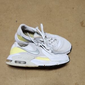 White and Yellow Nike Sneakers